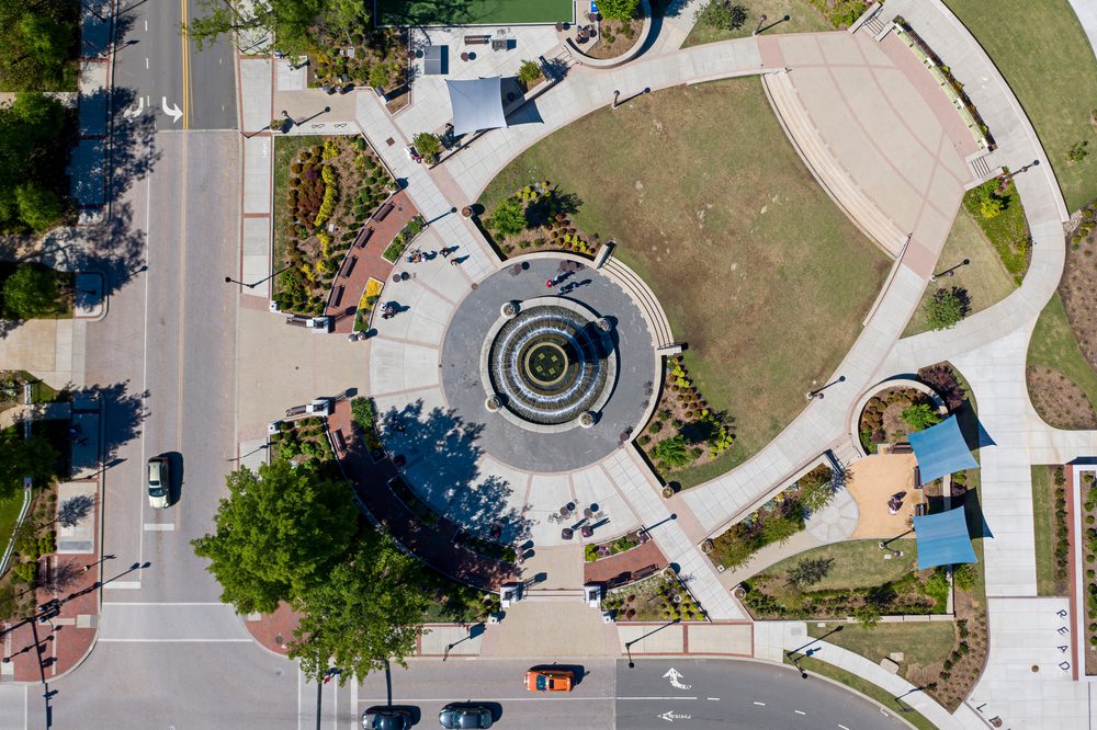 aerial view of park with fountain
